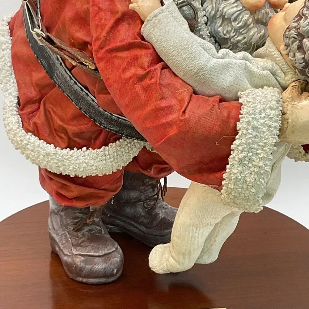 Clothtique Santa and Child Sculpture - Saturday Evening Post